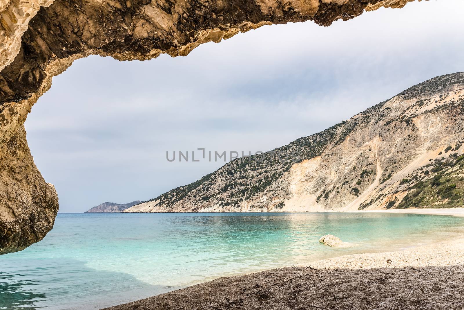 Cave outlook on sea mountain and beach by BenSchonewille