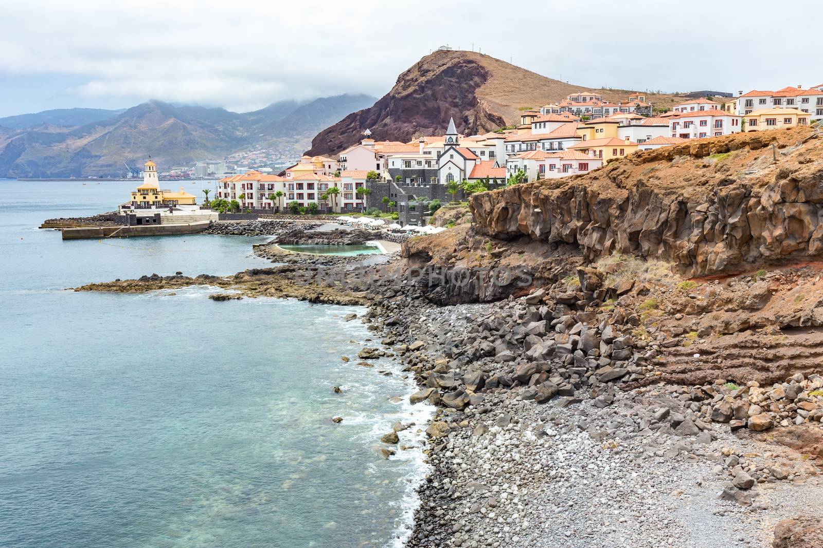 Portuguese coast with sea beach mountains and village by BenSchonewille