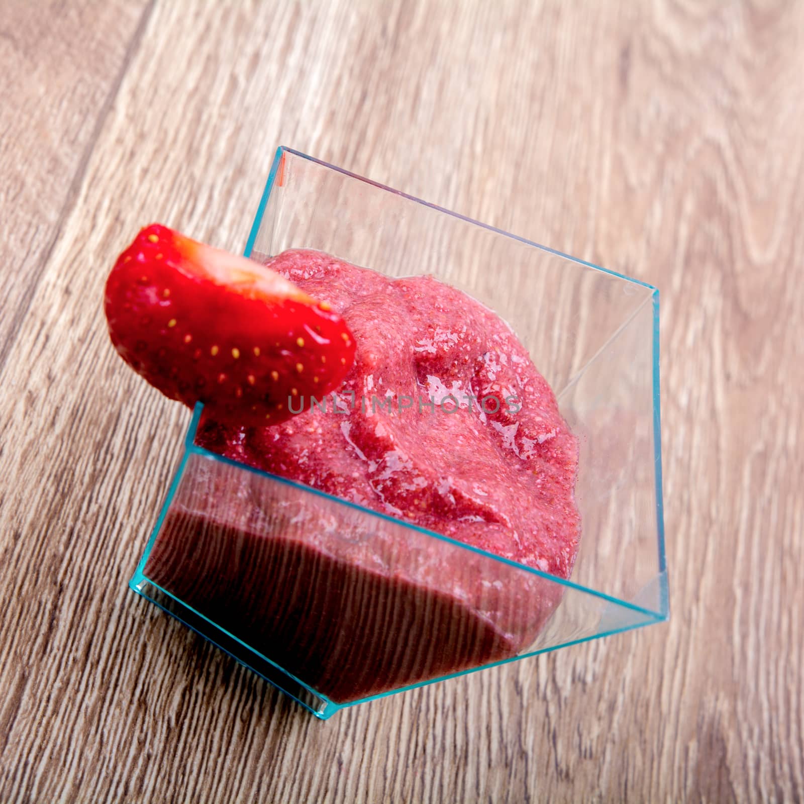 Strawberry puree, decorated with fresh strawberries
