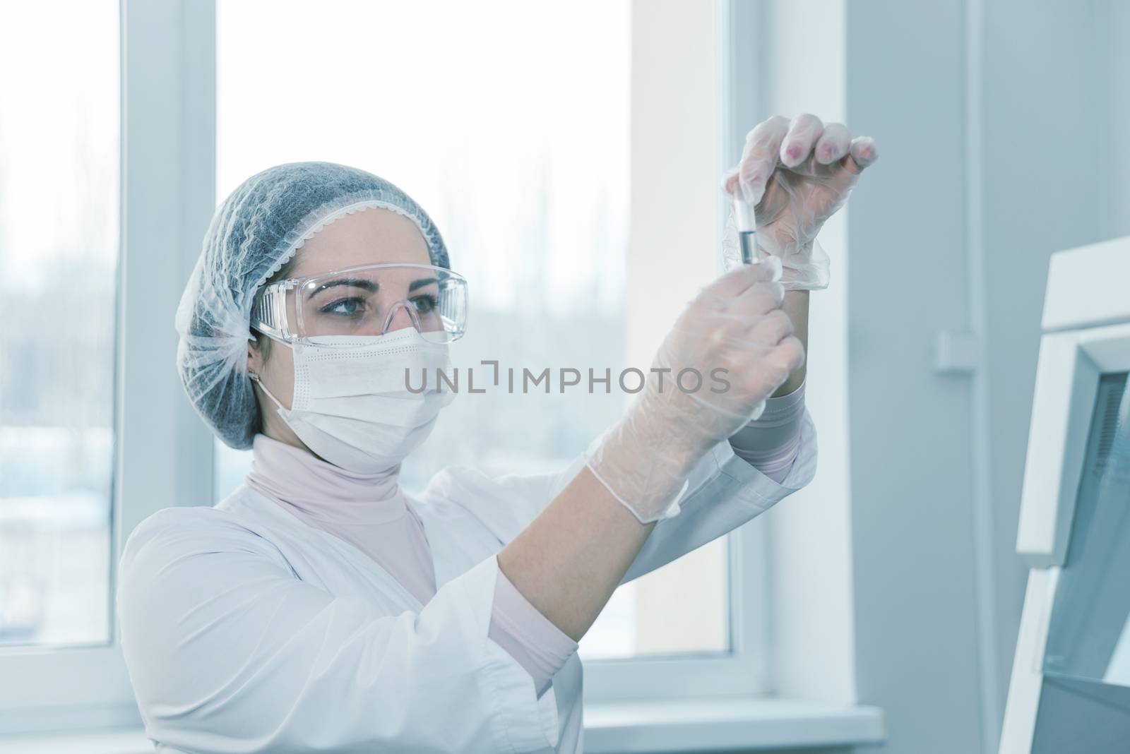 Woman scientist in a lab by Epitavi