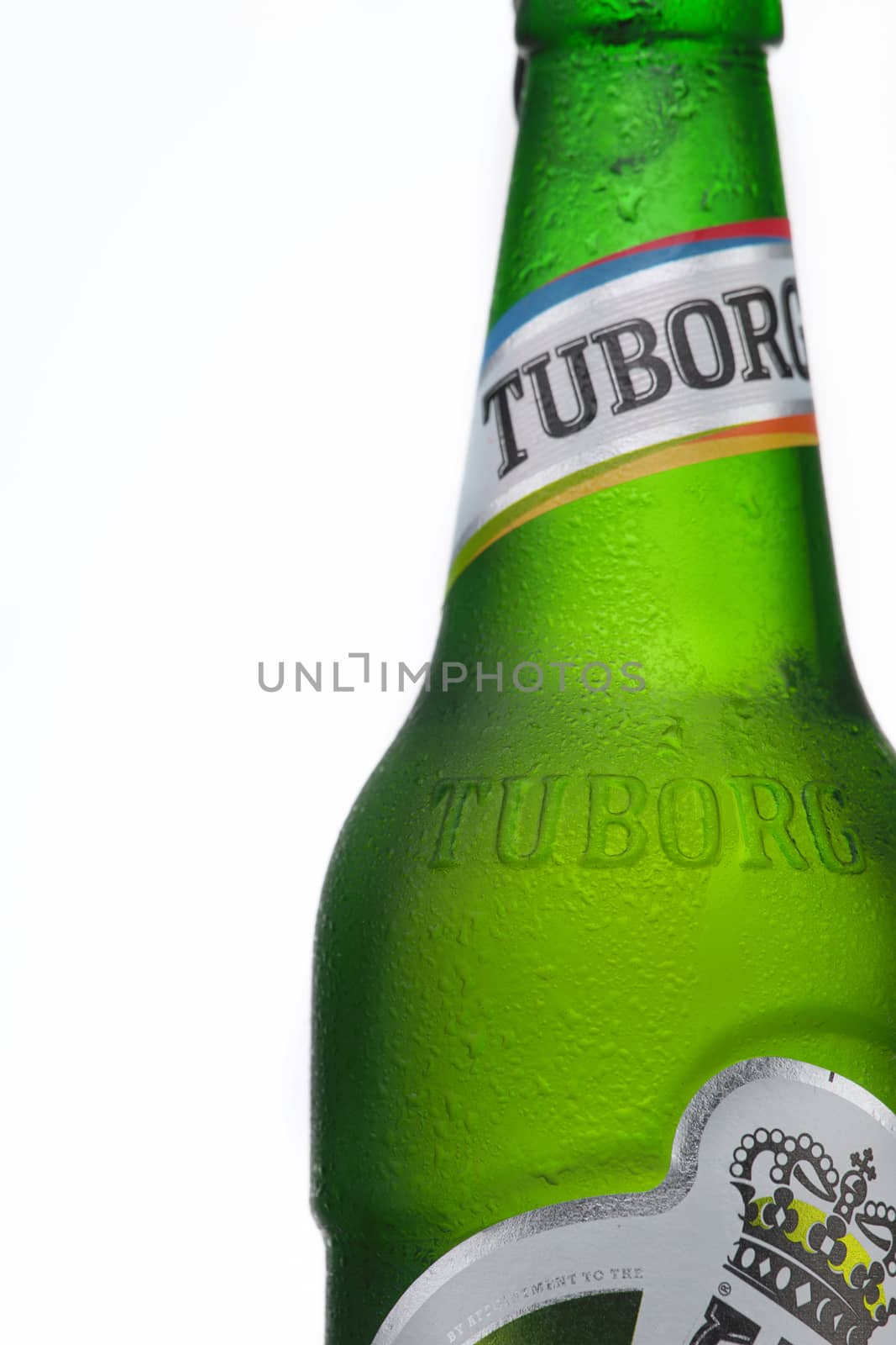 MINSK, BELARUS-AUGUST 23, 2016. Tuborg glass bottle beer ion isolated white background. by vmytra