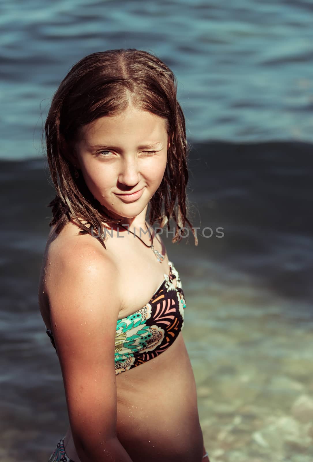 portrait girl on a background of blue sea