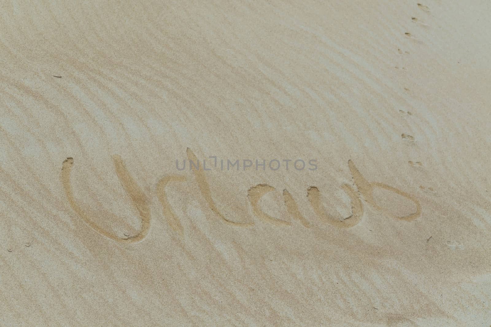 Sand word in German holiday.    by JFsPic