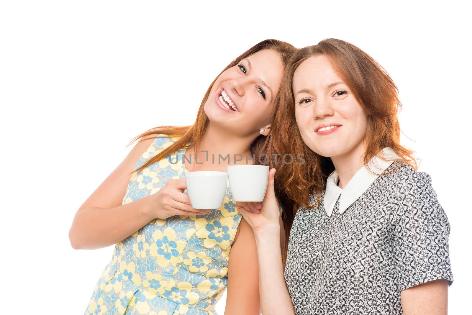 attractive girlfriends with coffee on a white background posing