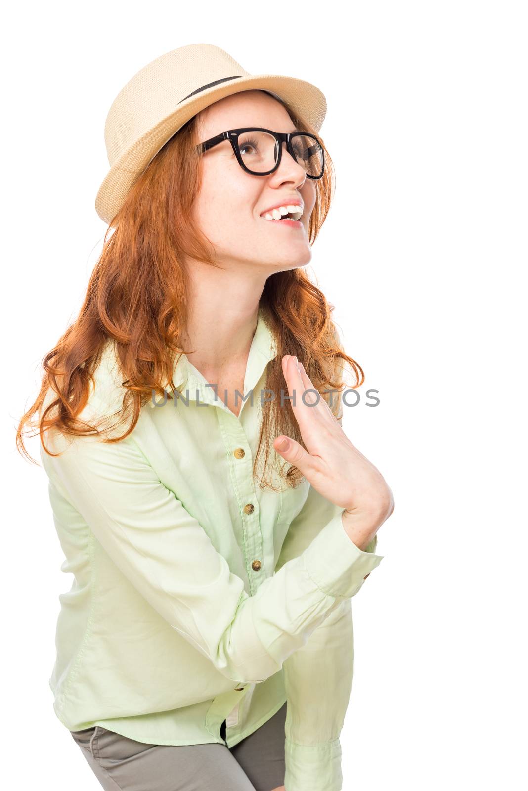 Active girl wearing a straw hat and glasses on a white background