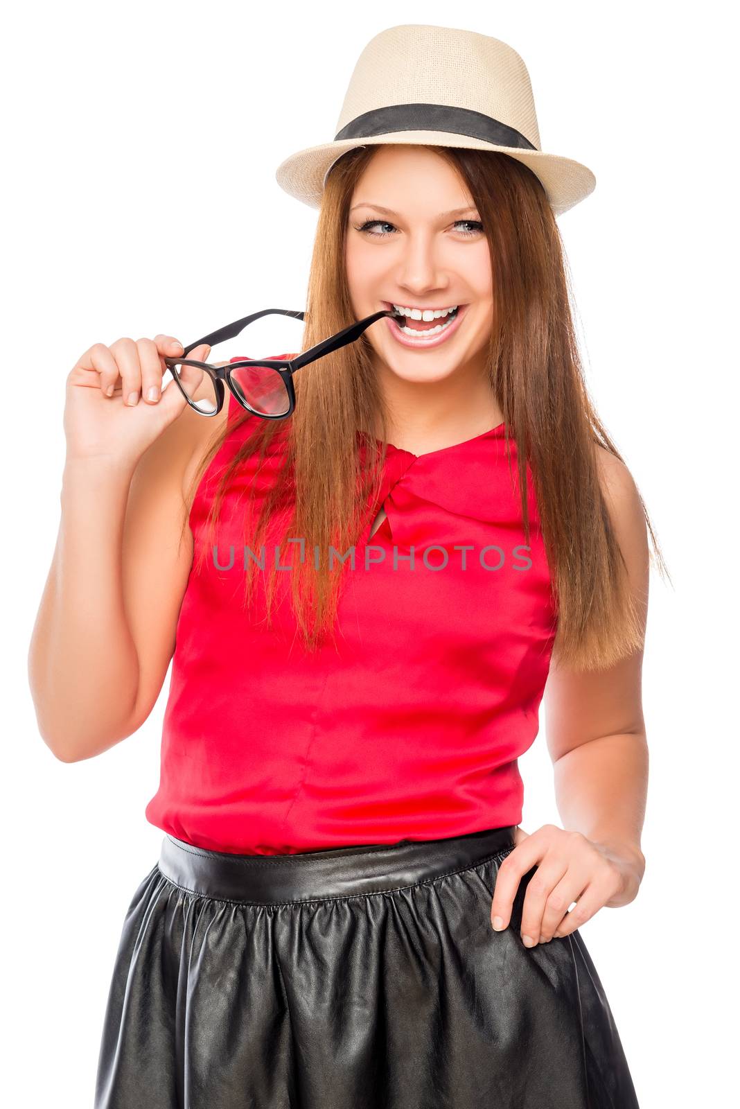 playful young woman with glasses on a white background