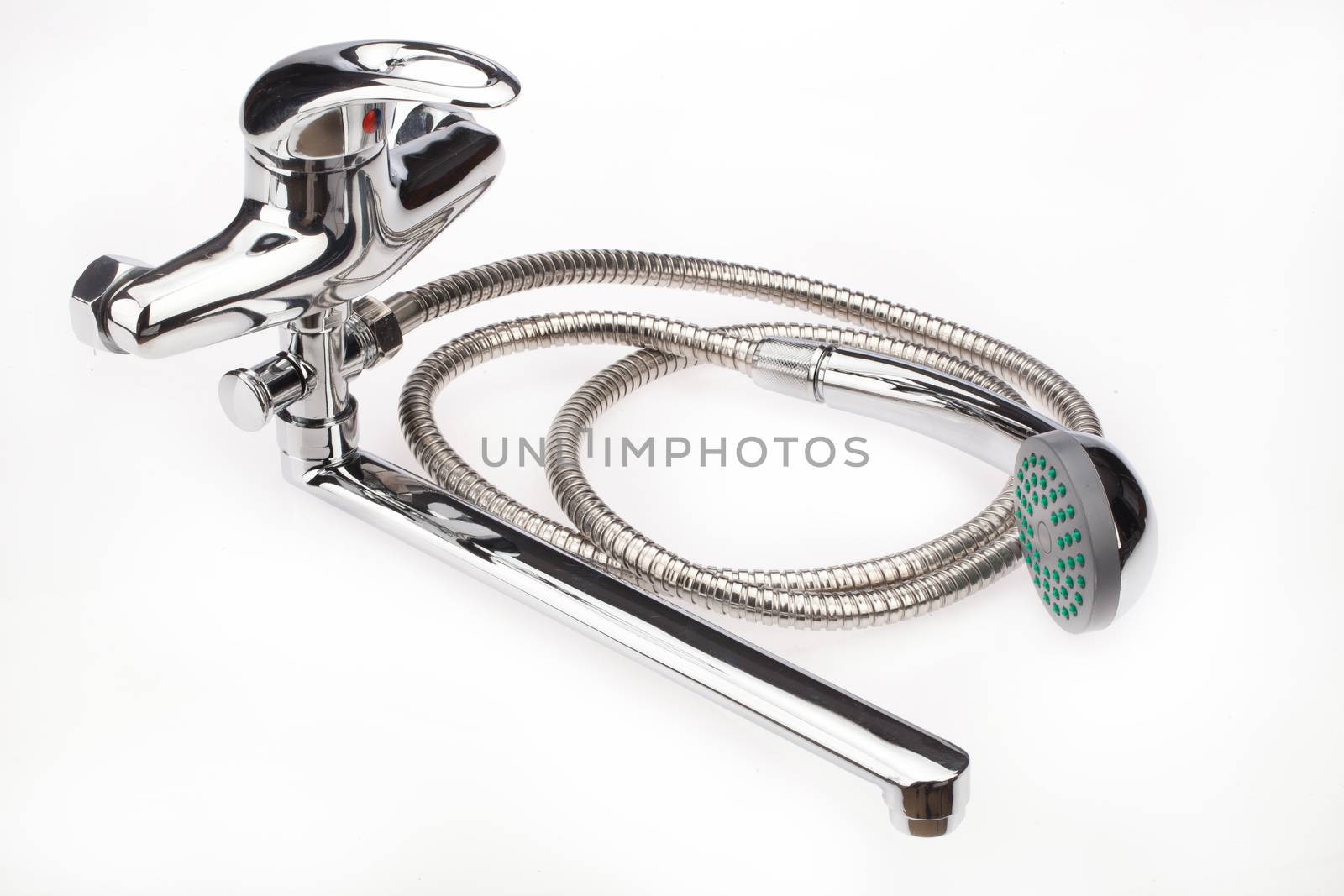 Metal chromium-plated water mixer on an isolated background