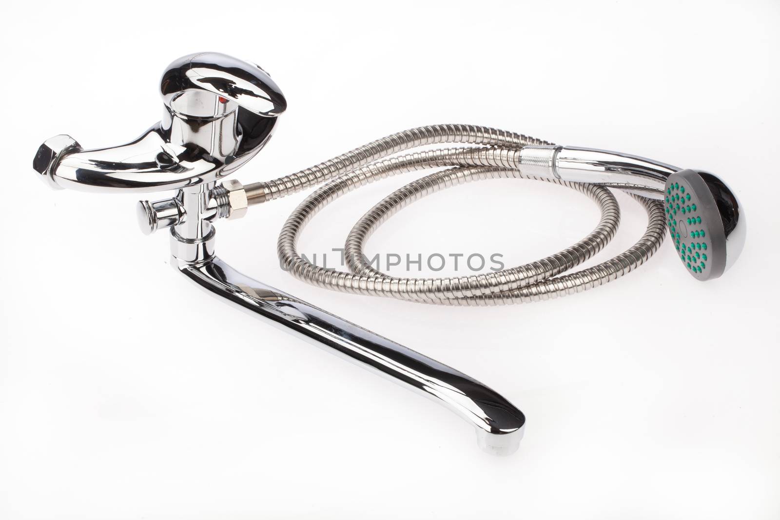 Metal chromium-plated water mixer on an isolated background