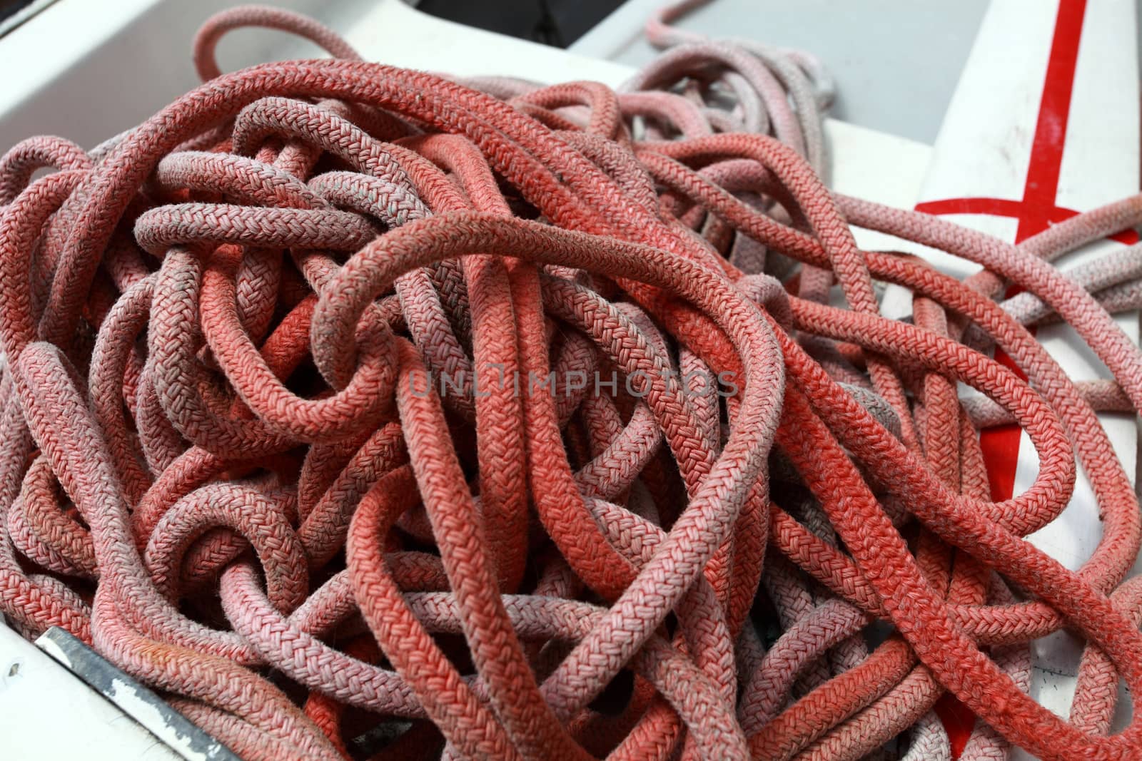 red rope skein fisherman on boat