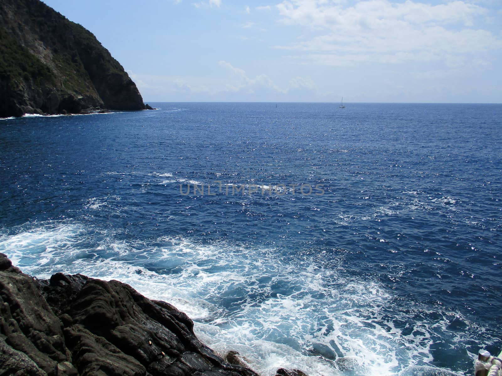 waves crashing on the rocks of the 5 lands, Liguria, Italy