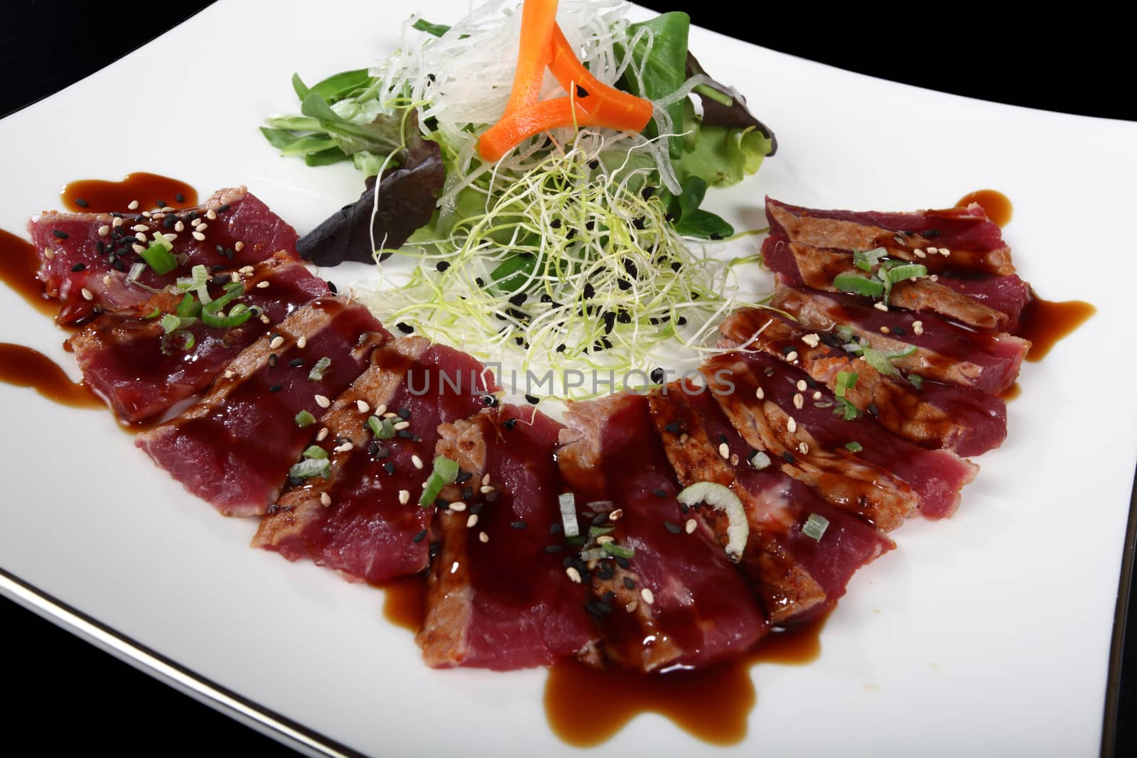 dish of Japanese cuisine meat, rice, fish and vegetables