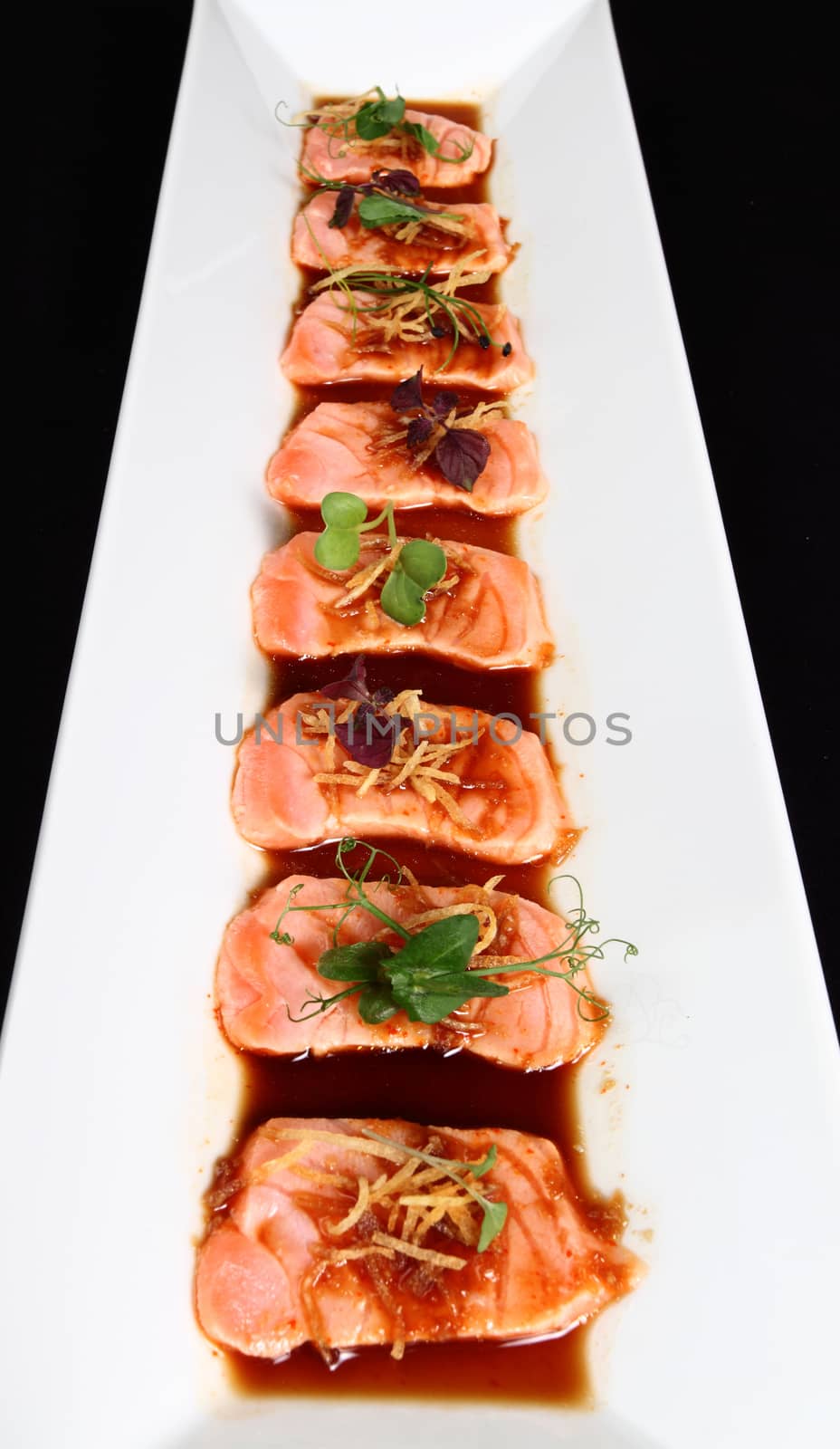 salmon steak with sauce by diecidodici