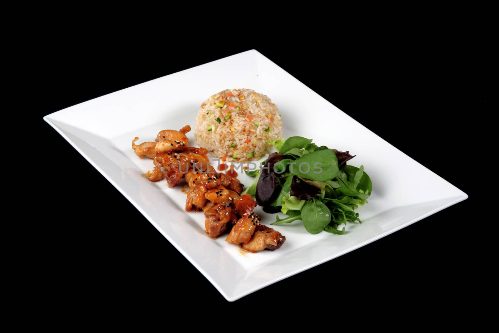 menu of chicken with rice and vegetables on white plate, on black background