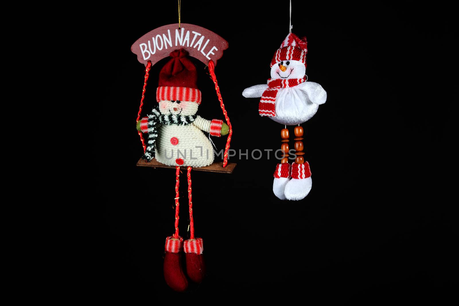 Christmas decorations to hang on the Christmas tree on a black background