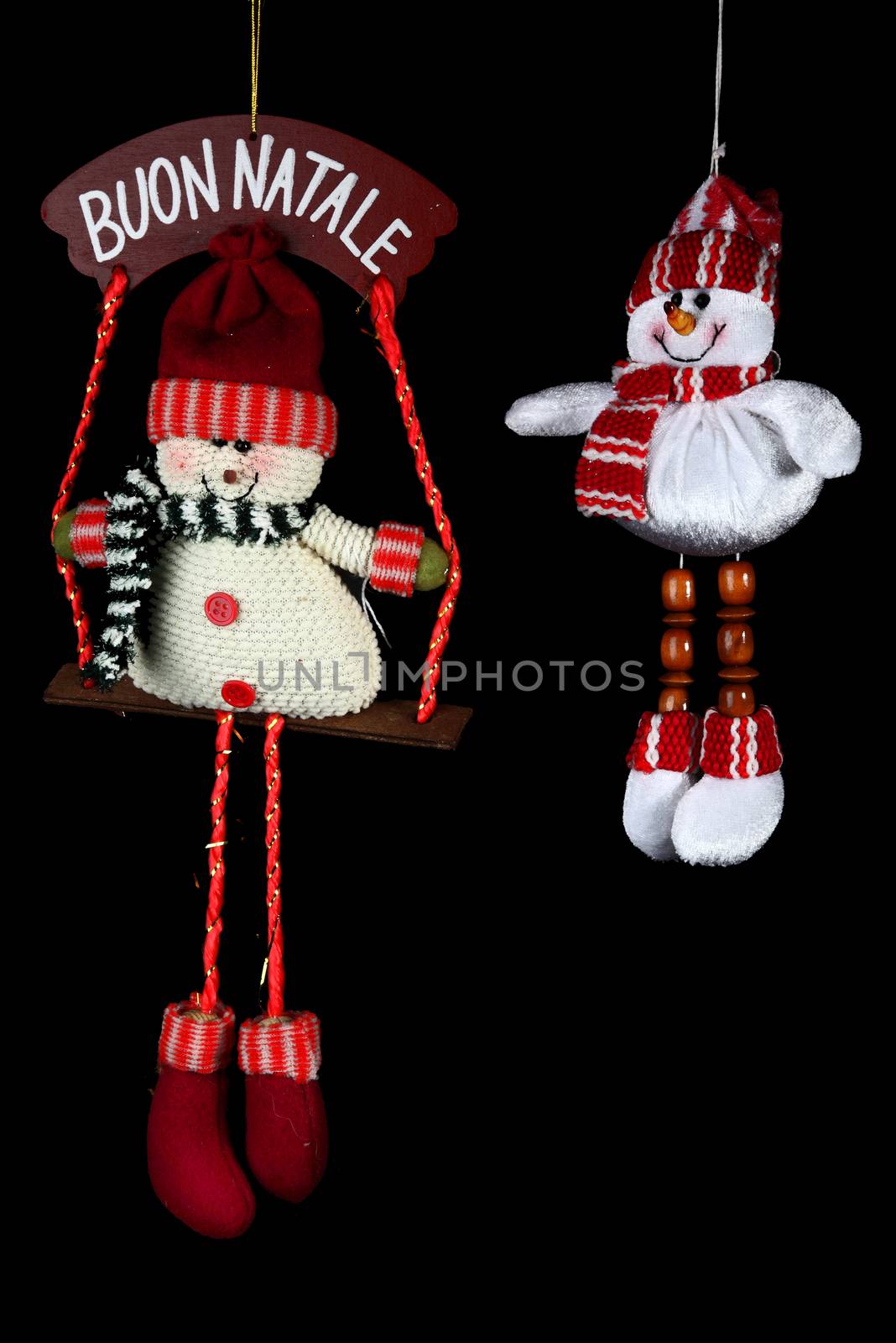 Christmas decorations to hang on the Christmas tree on a black background