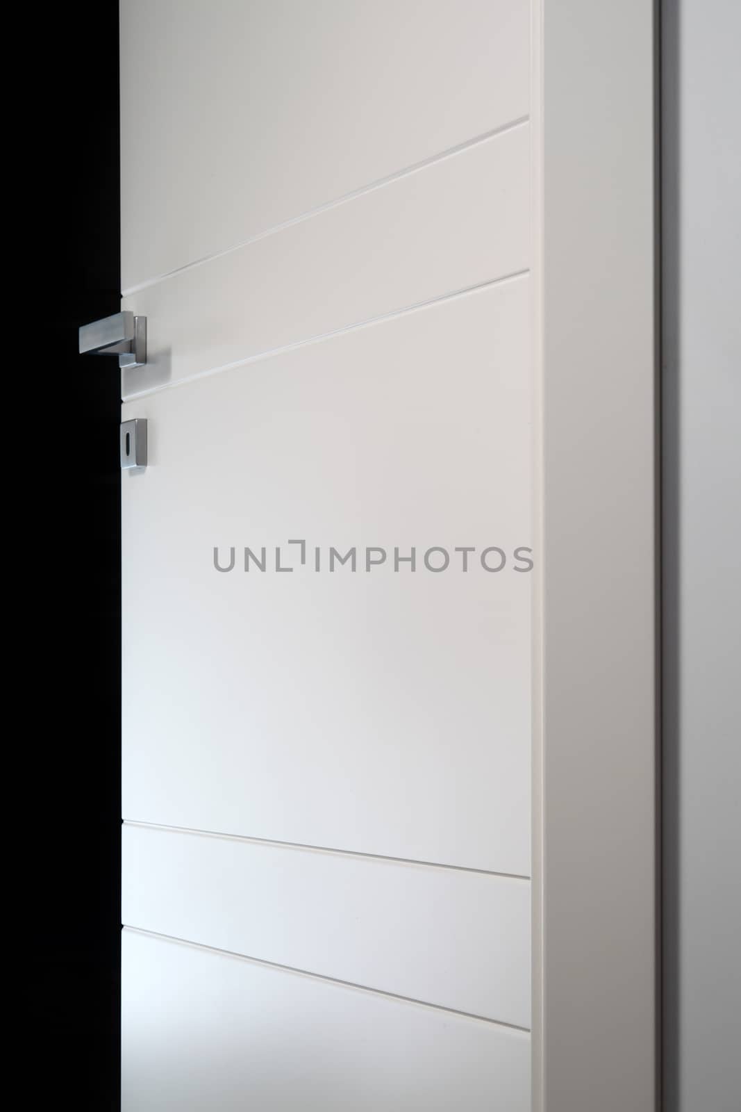 detail open white door by diecidodici