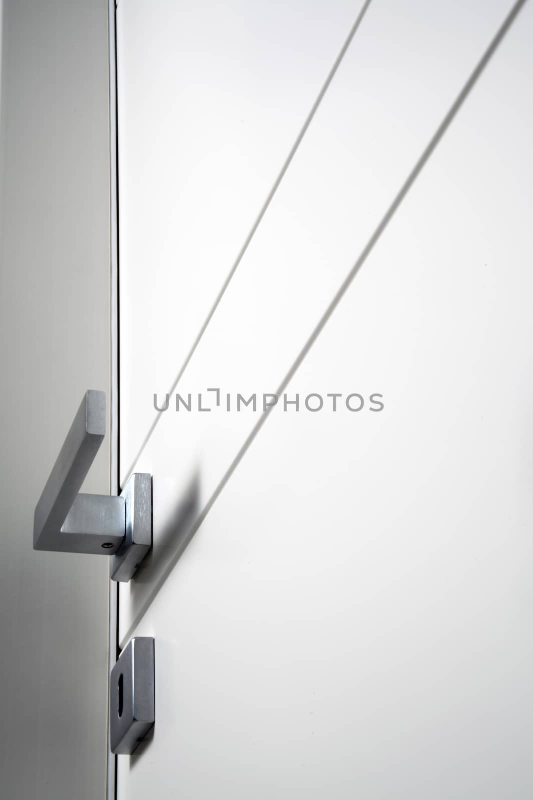 open white door on gray background