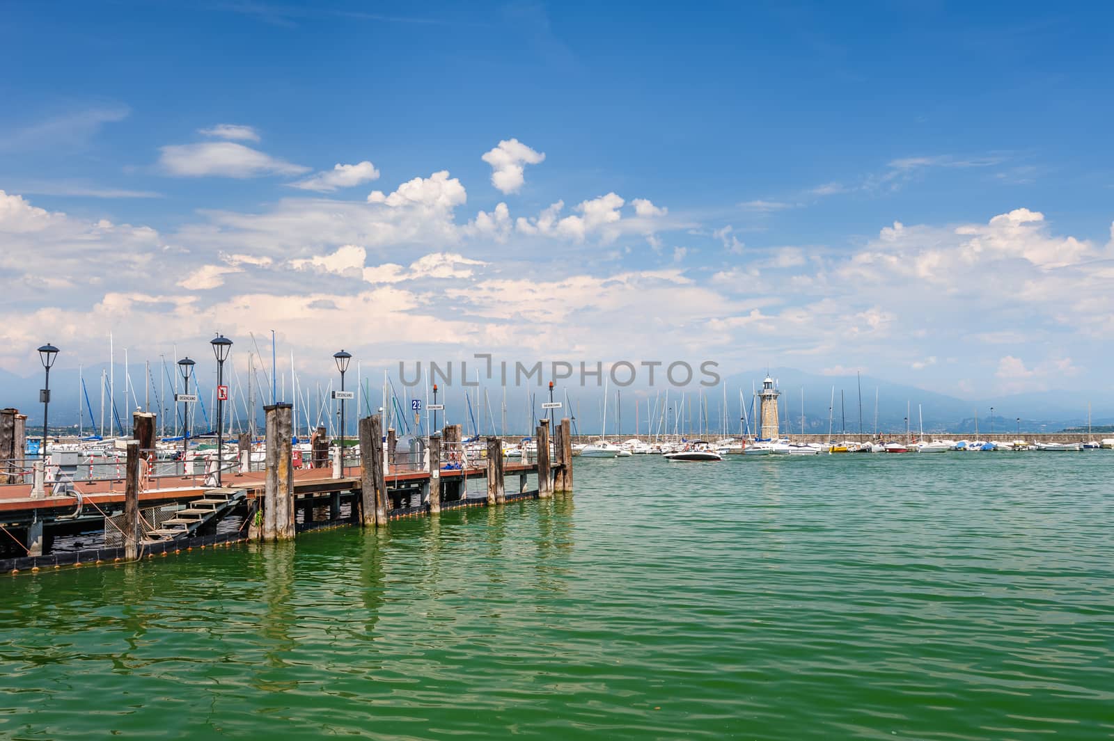 Small yachts in harbor in Desenzano, Garda lake, Italy by starush