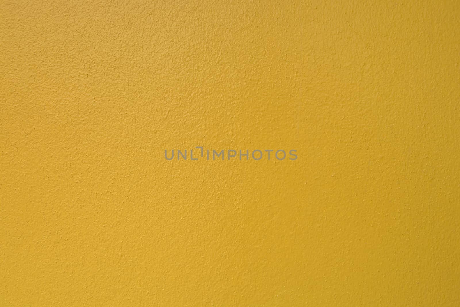 Yellow concrete wall as Texture Background
