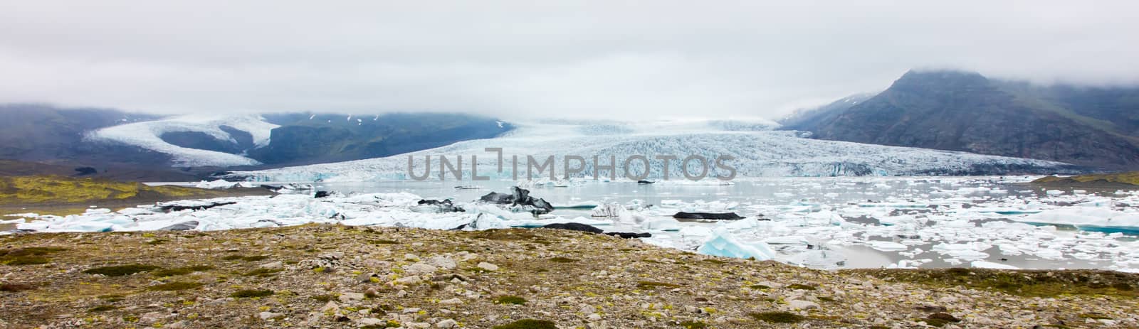 Jokulsarlon is a large glacial lake in southeast Iceland - Ice breaking of a glacier