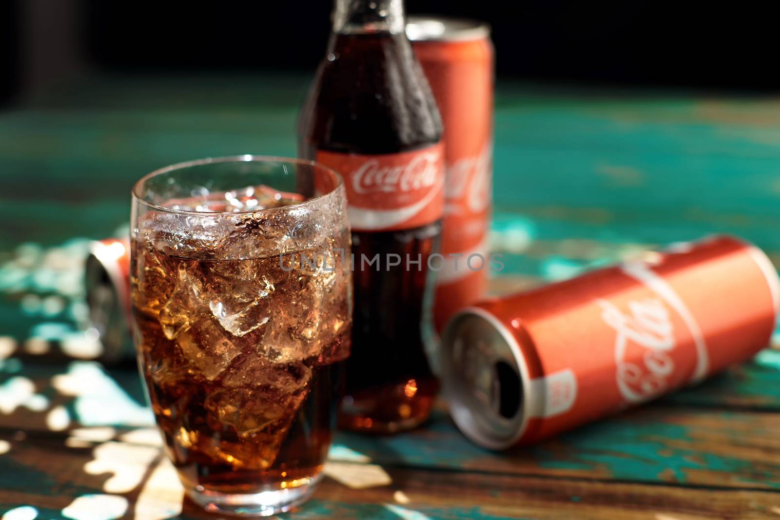 Coca-Cola is a carbonated soft drink popular all over the world. She is sold in restaurants, stores, everywhere.