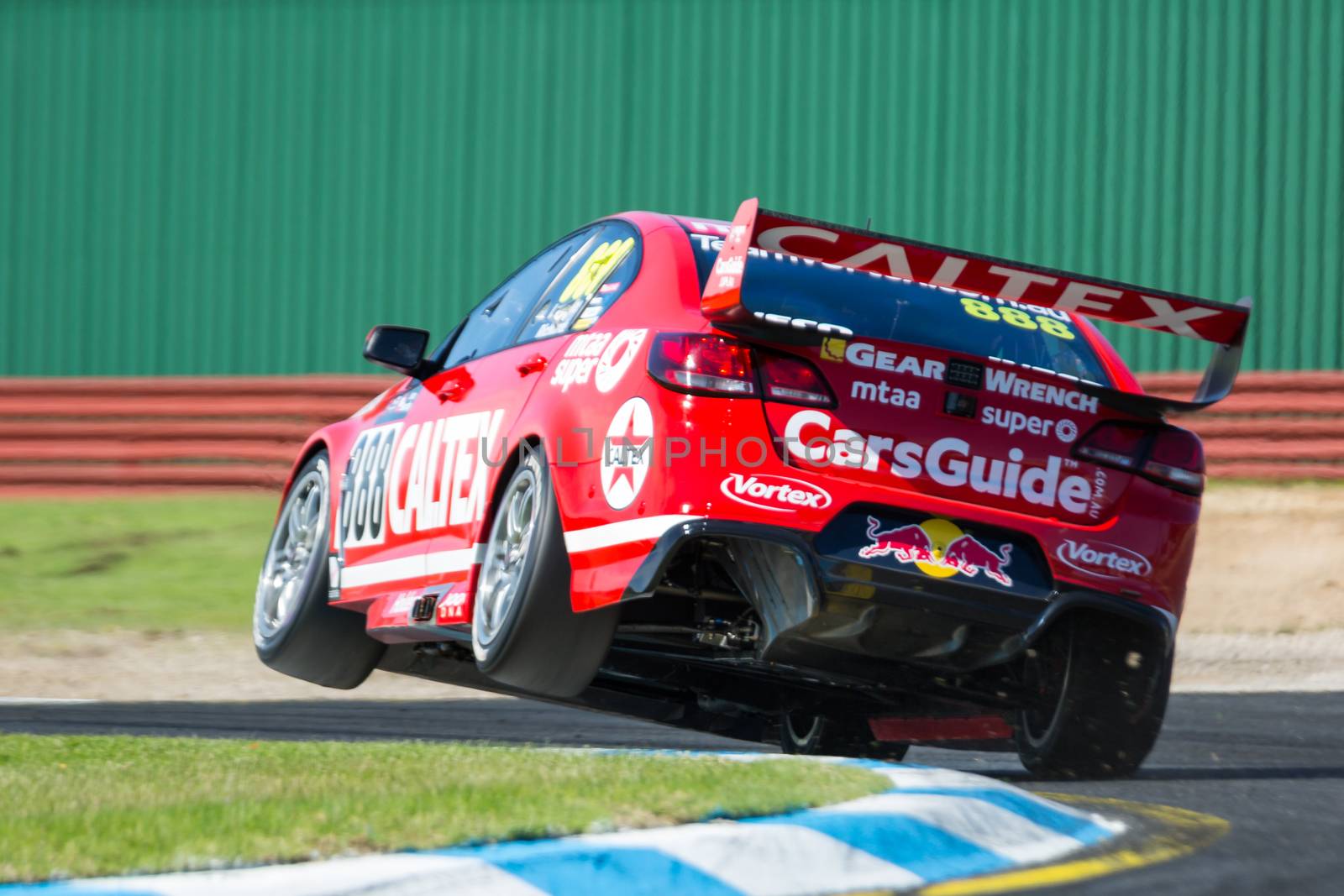 MELBOURNE/AUSTRALIA - SEPTEMBER 17, 2016: Supercars in qualifying session for the Sandown 500 'Retro' Endurance race at Sandown raceway.