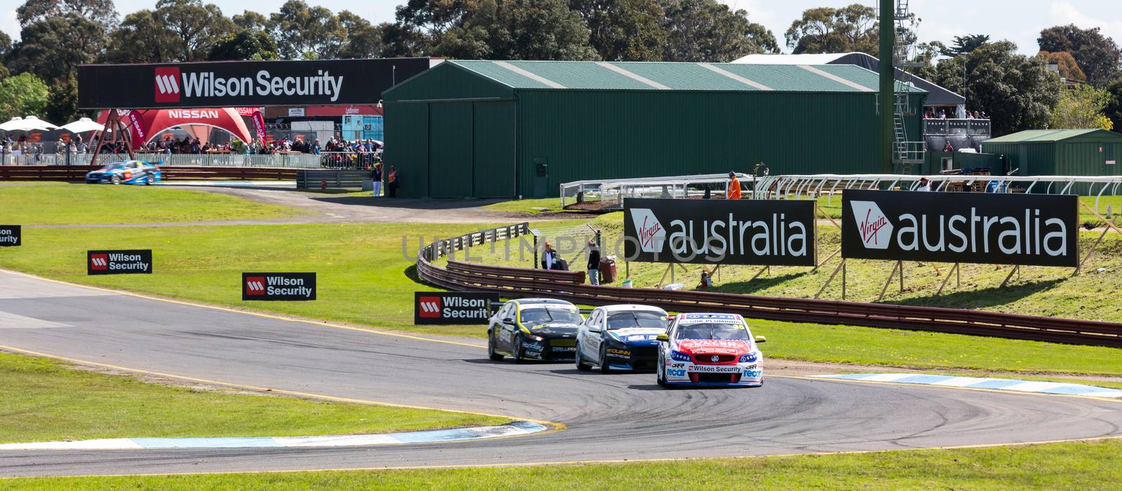 MELBOURNE/AUSTRALIA - SEPTEMBER 17, 2016: Supercars in qualifying session for the Sandown 500 'Retro' Endurance race at Sandown raceway.
