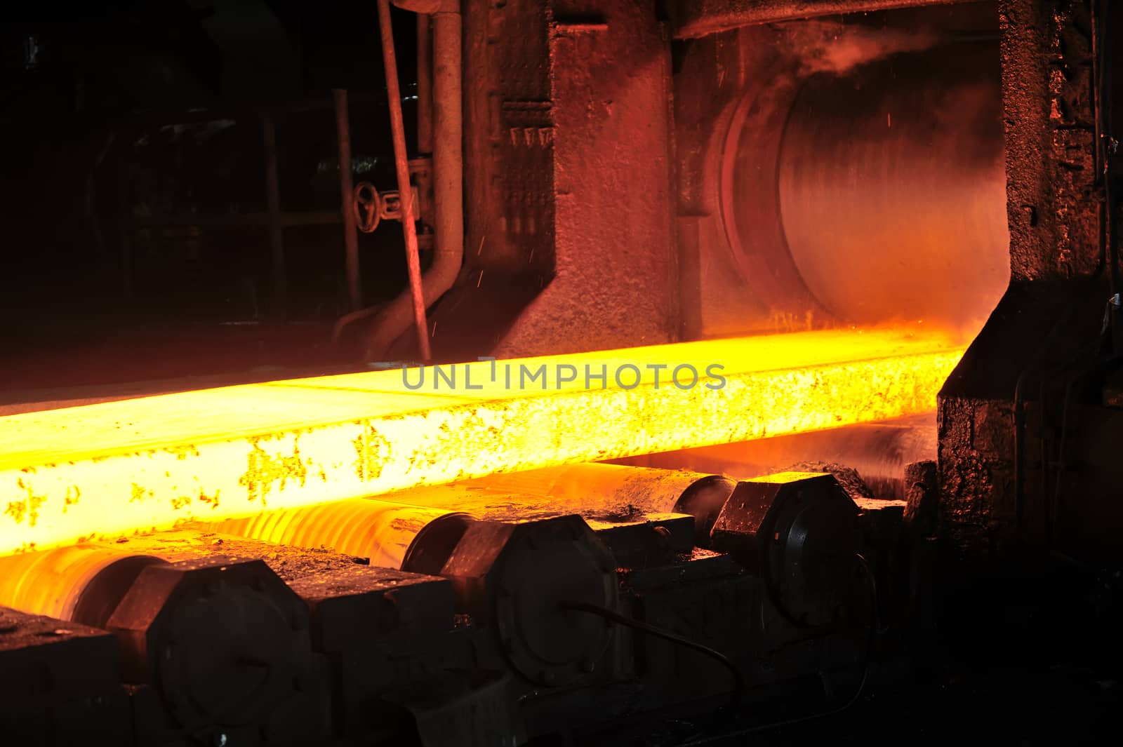 hot steel plate on conveyor in steel plant