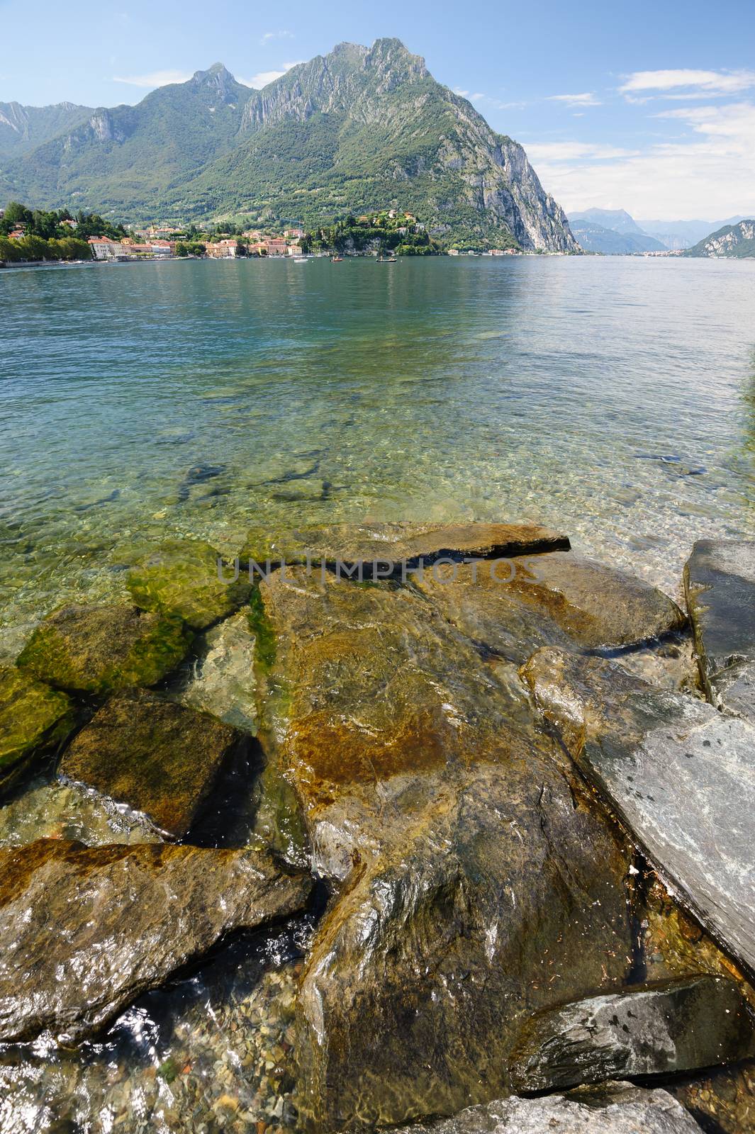 High mountains and village at other coast of Como lake, Lecco, italy