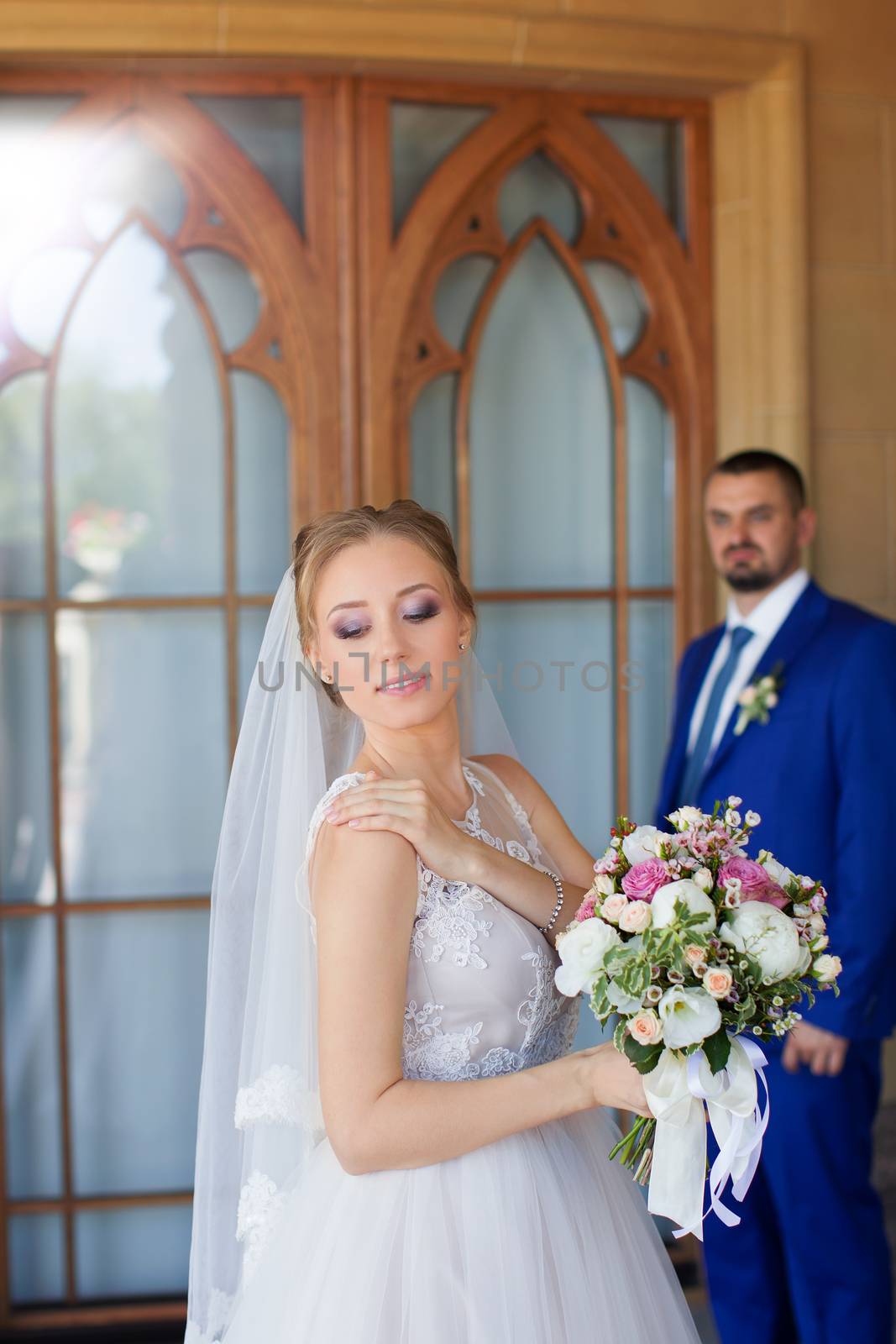 Newlyweds on a walk in a summer day wedding