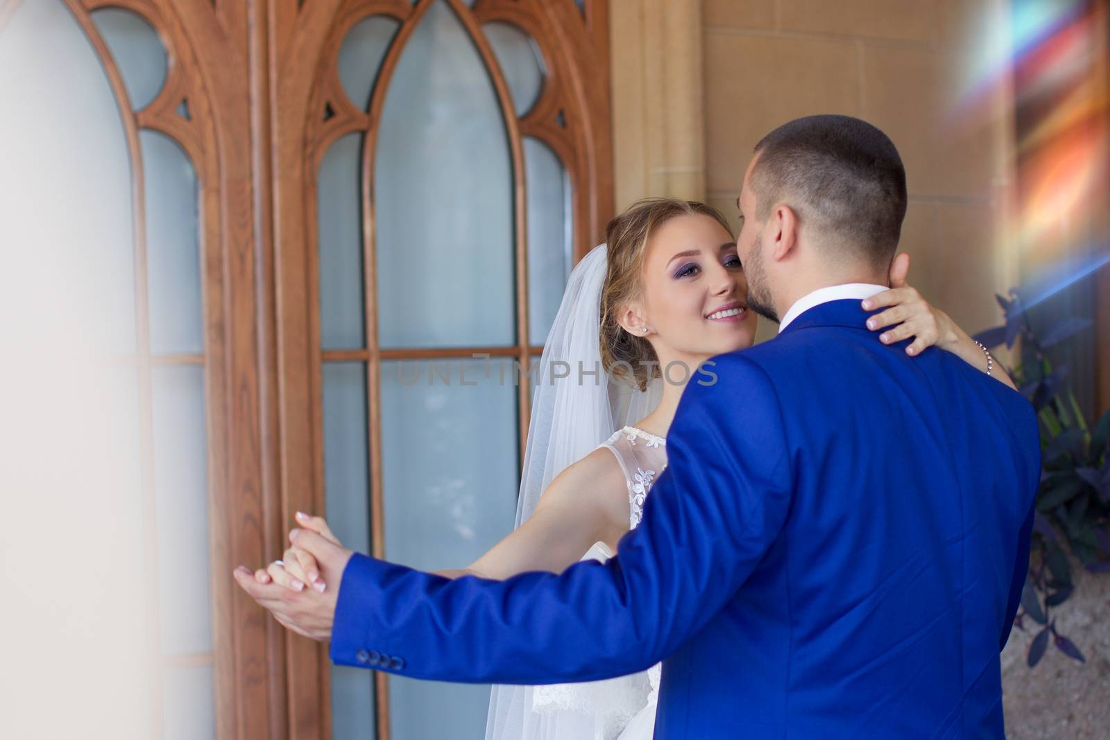 Newlyweds on a walk in a summer day wedding