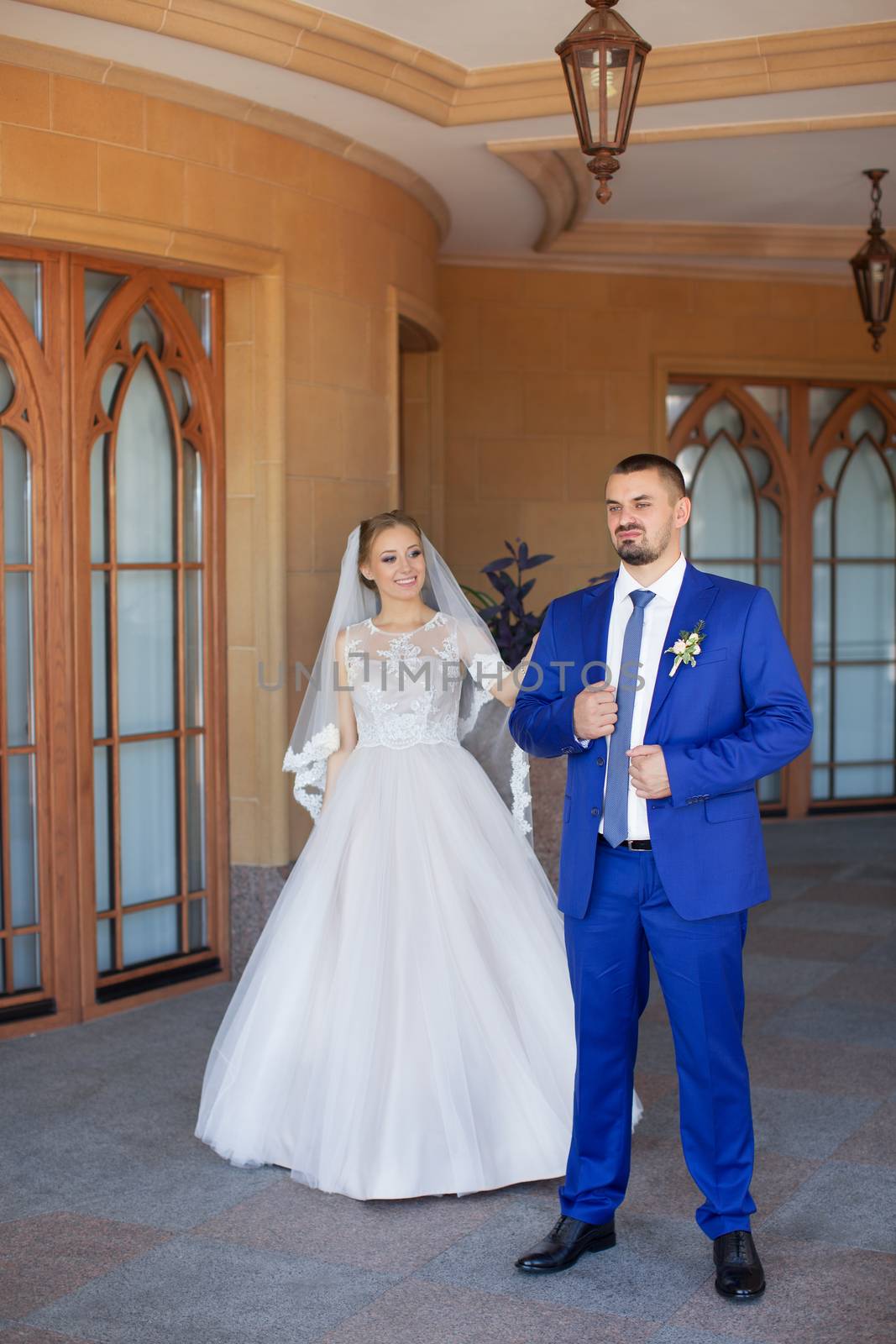 Newlyweds on a walk in a summer day wedding