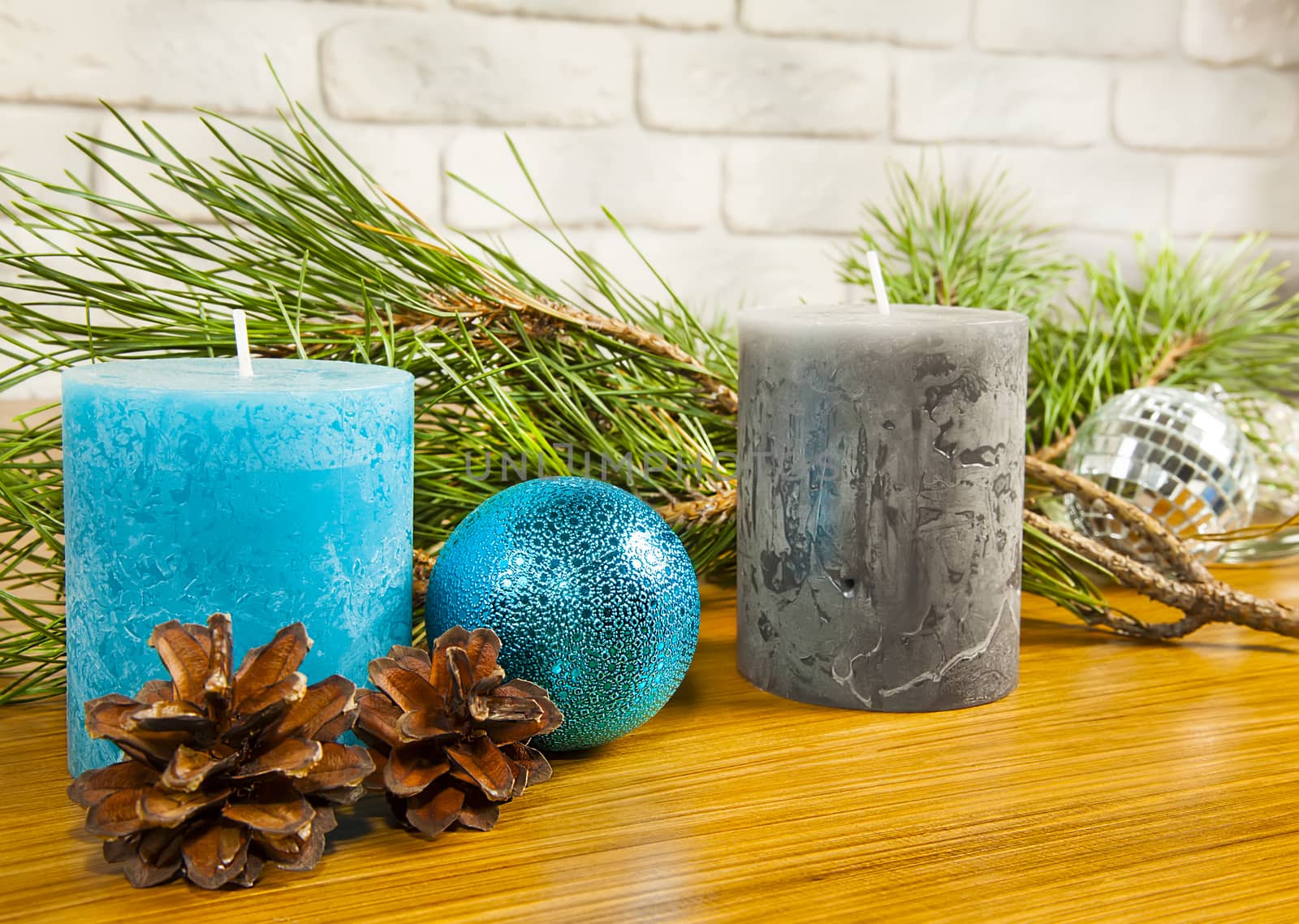 New Year and Christmas composition with fir cones and two candle by RawGroup
