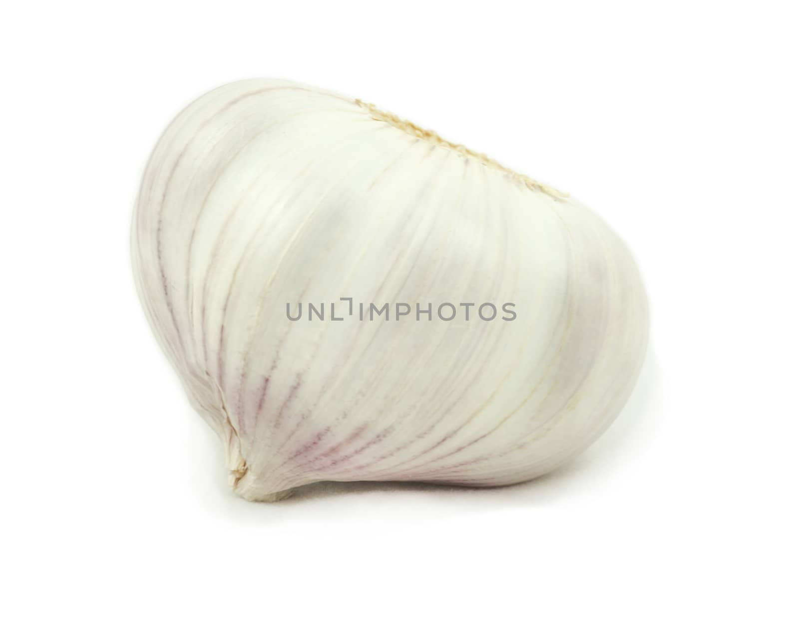 Close-up of garlic bulb isolated on a white background.