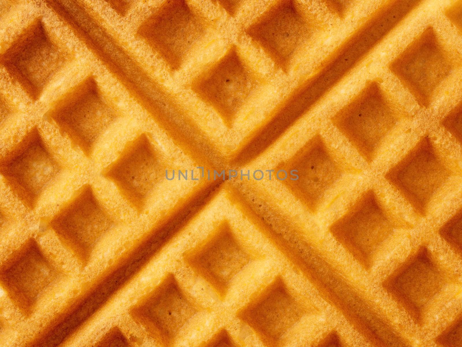 close up of rustic golden plain waffle food background