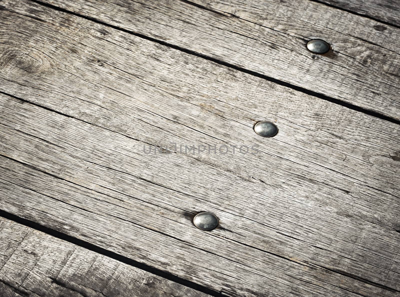 abstract background detail riveted on wooden boards