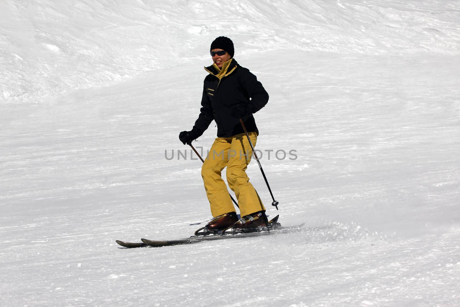 Skier riding fresh powder snow. Europe. Russia. Caucasus.