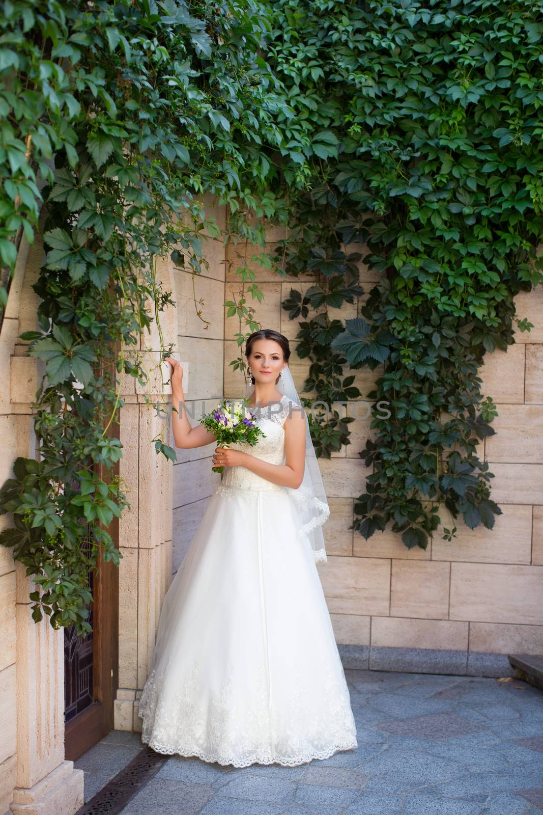 Stylish Bride in an expensive white dress