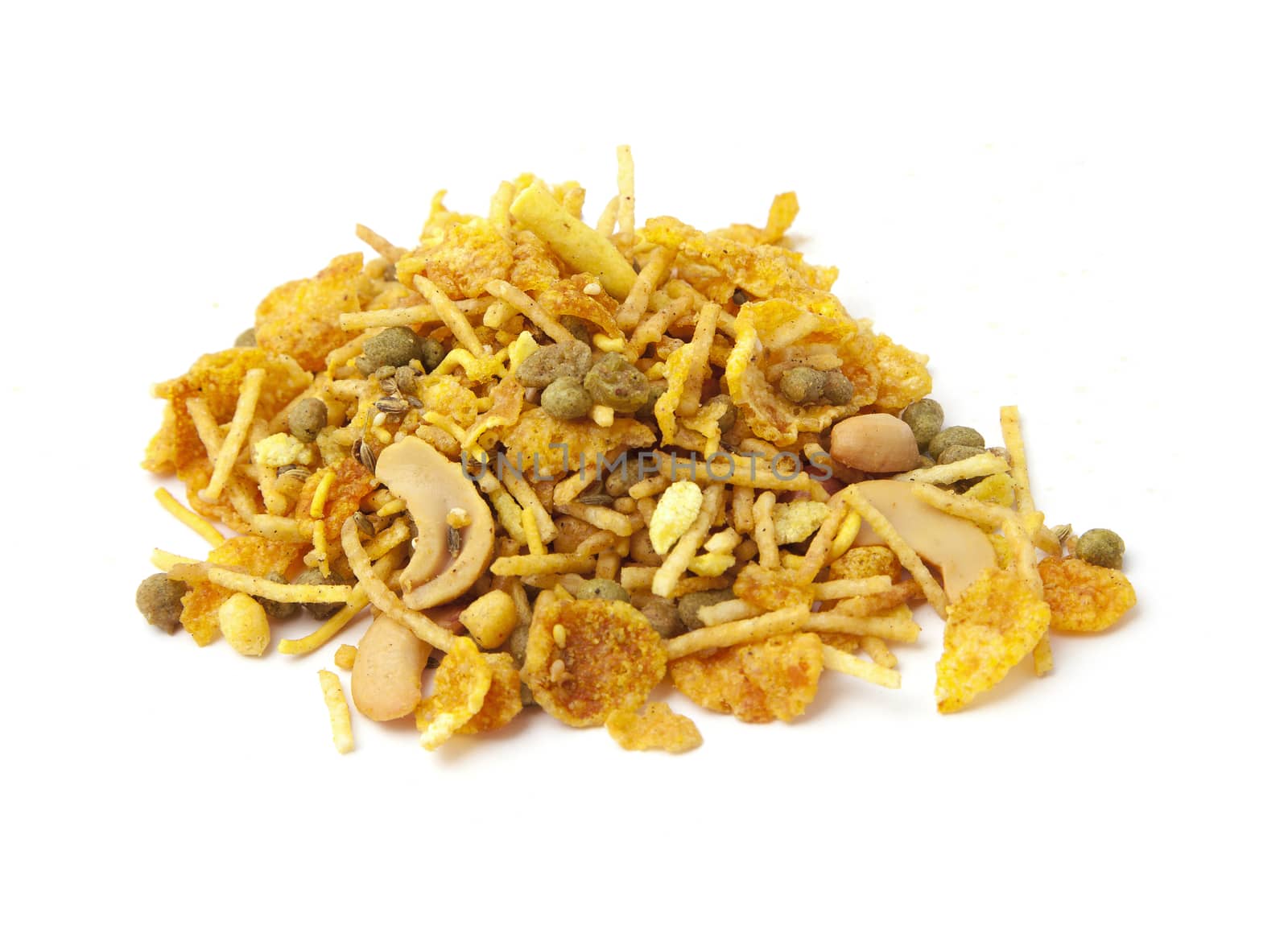 Pile of dry roasted Indian snack mix, isolated over white
