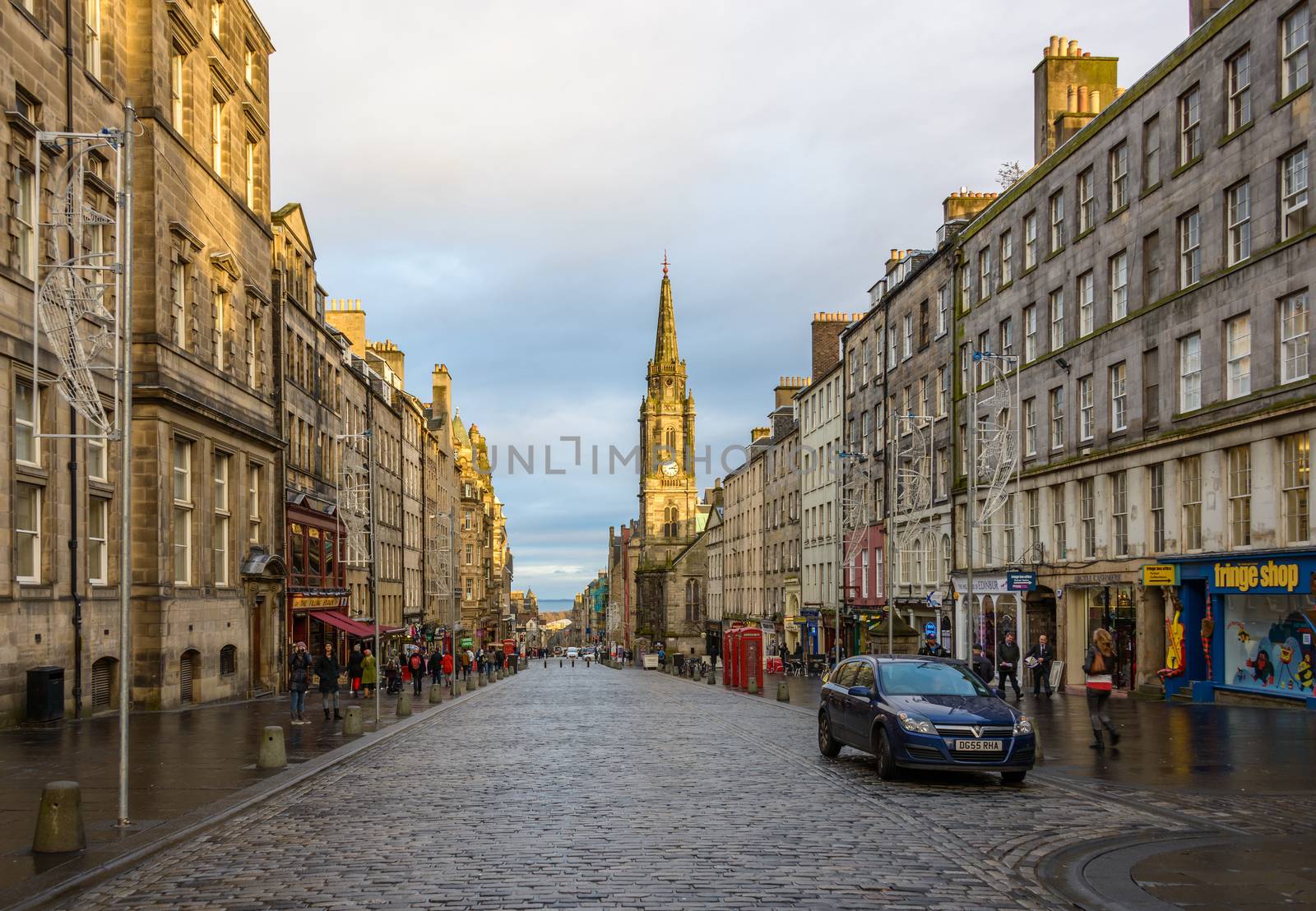 EDINBURGH, SCOTLAND - CIRCA NOVEMBER 2012: The Royal Mile at sunset and Tron Kirk former church.