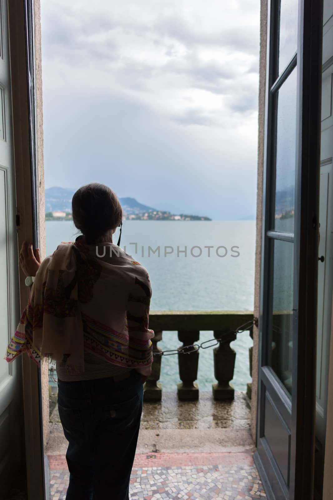 woman looking over Lake Maggiore  by MegaArt