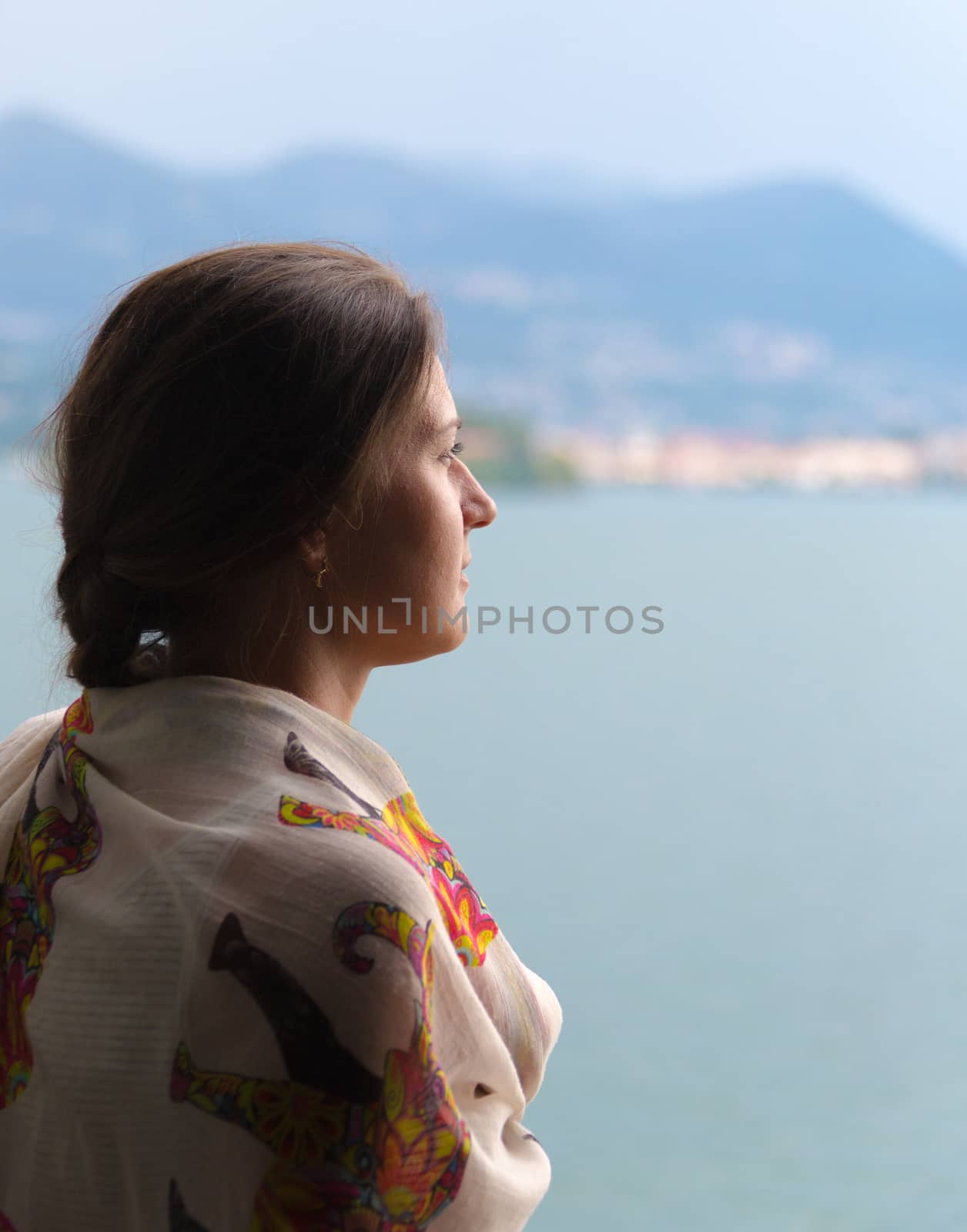 woman looking over Lake Maggiore  by MegaArt