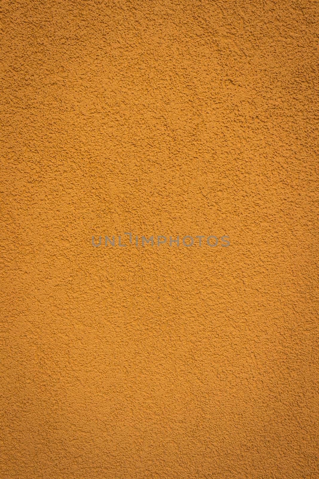 wall color bronze background and texture with vignetting and blank copyspace for text or advertising.