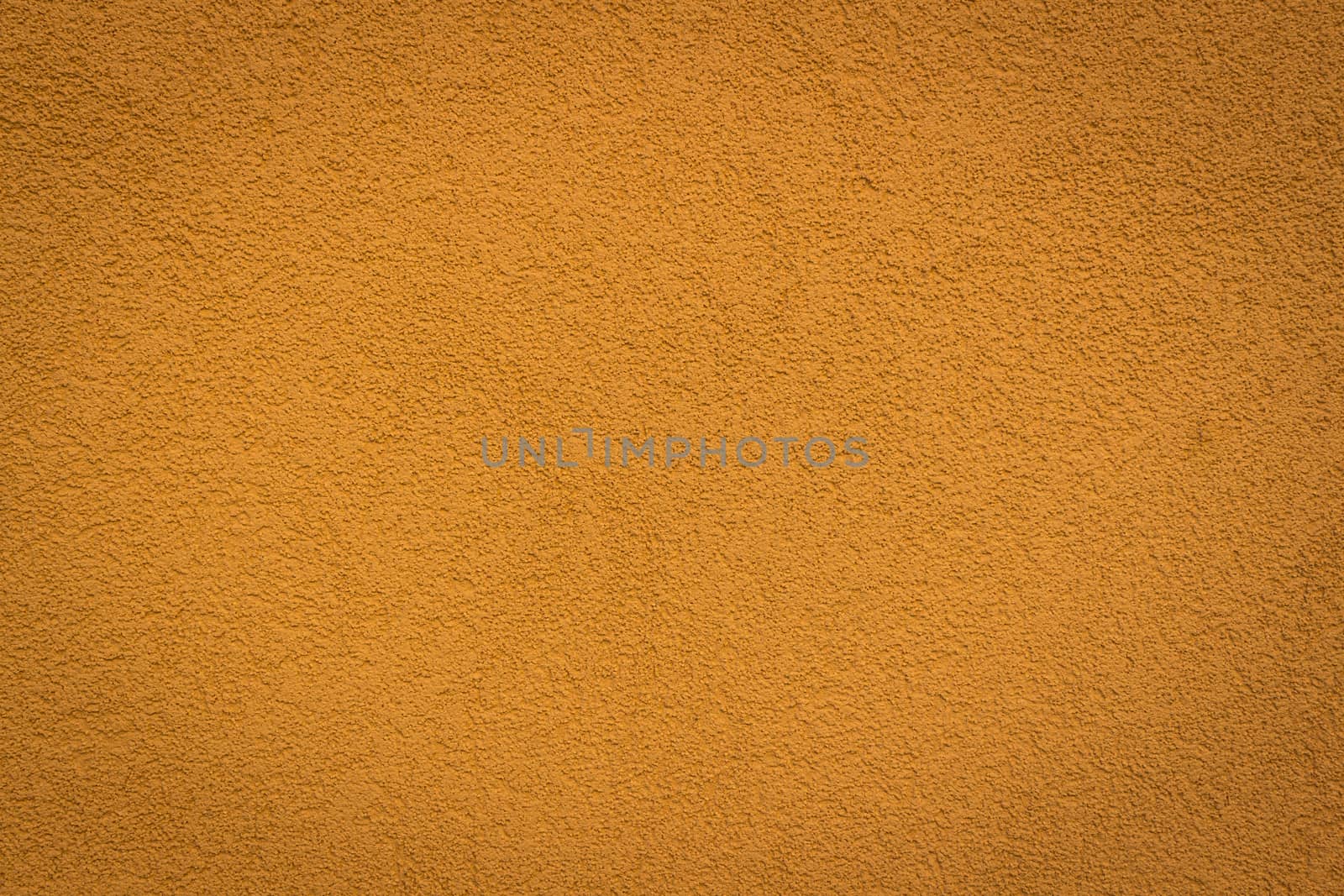 wall color bronze background and texture with vignetting and blank copyspace for text or advertising.