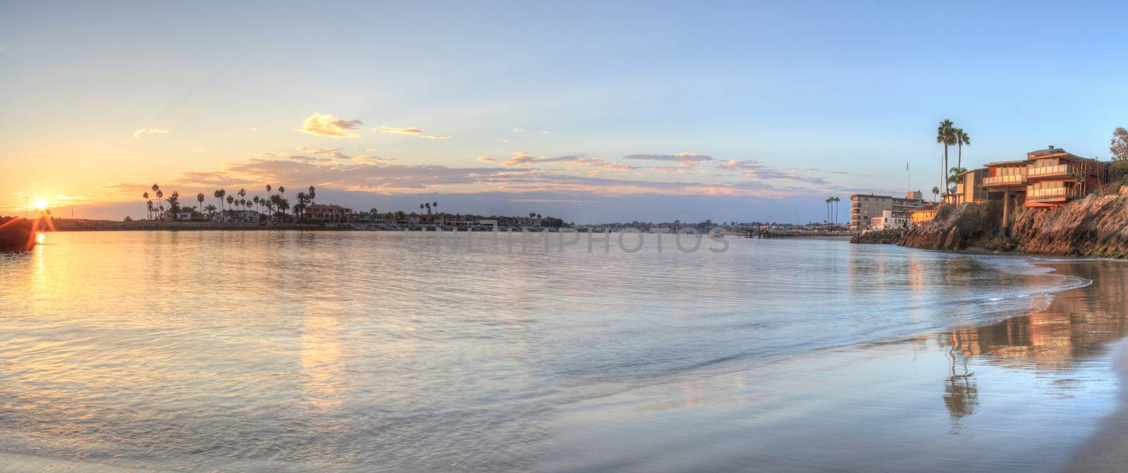 Sunset over the harbor in Corona del Mar, California at the beach in the United States