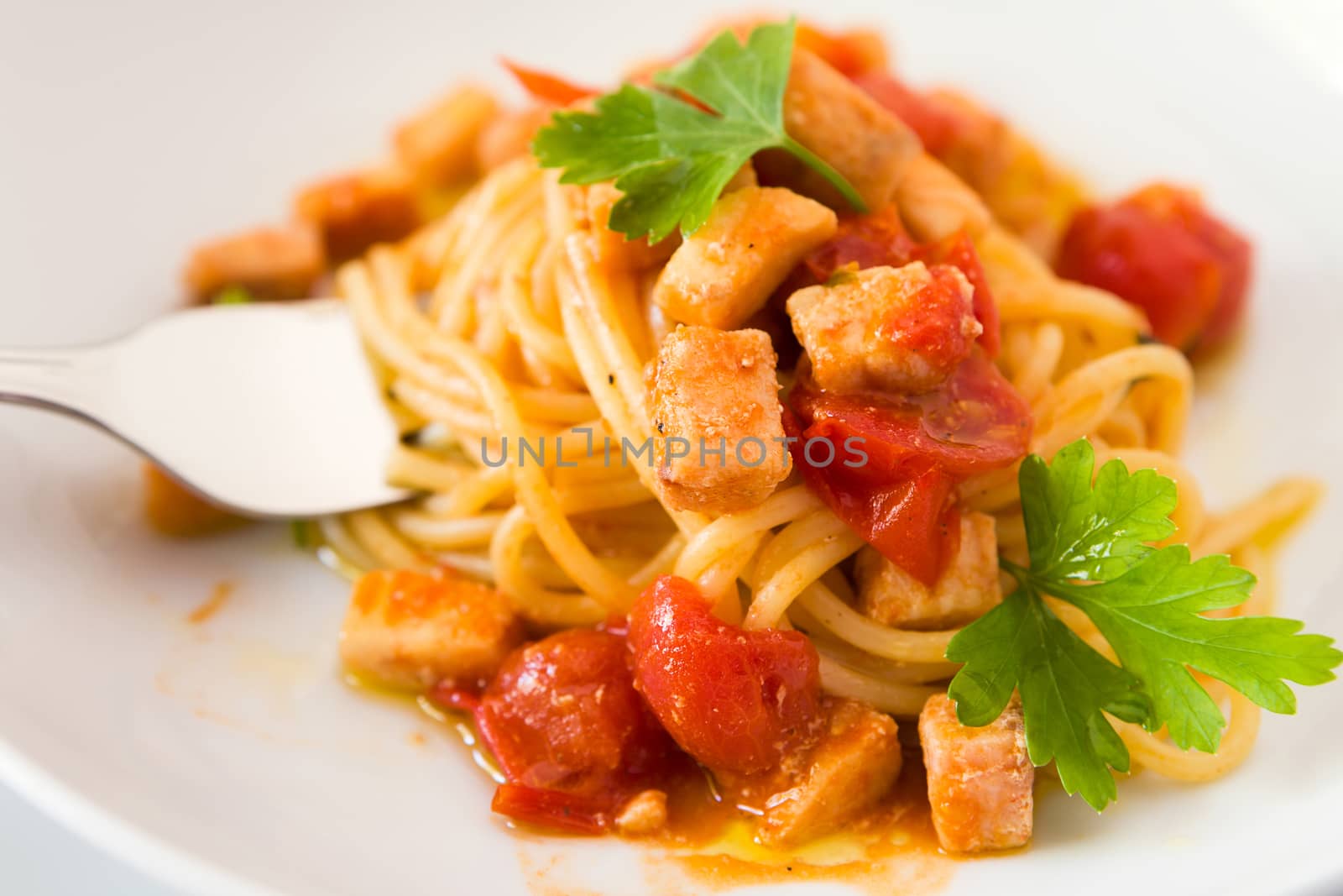 Spaghetti with fish little tomatoes and parsley by LuigiMorbidelli