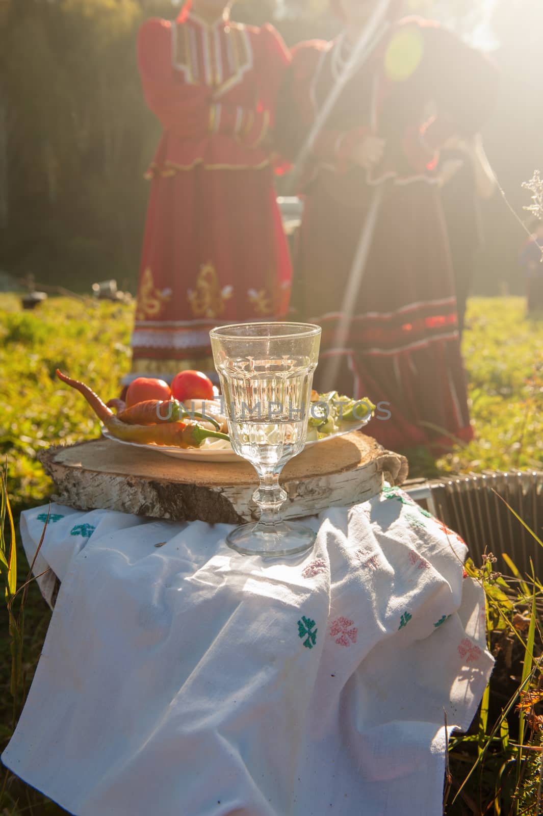 Russian vodka in small glass with snacks at outdoors