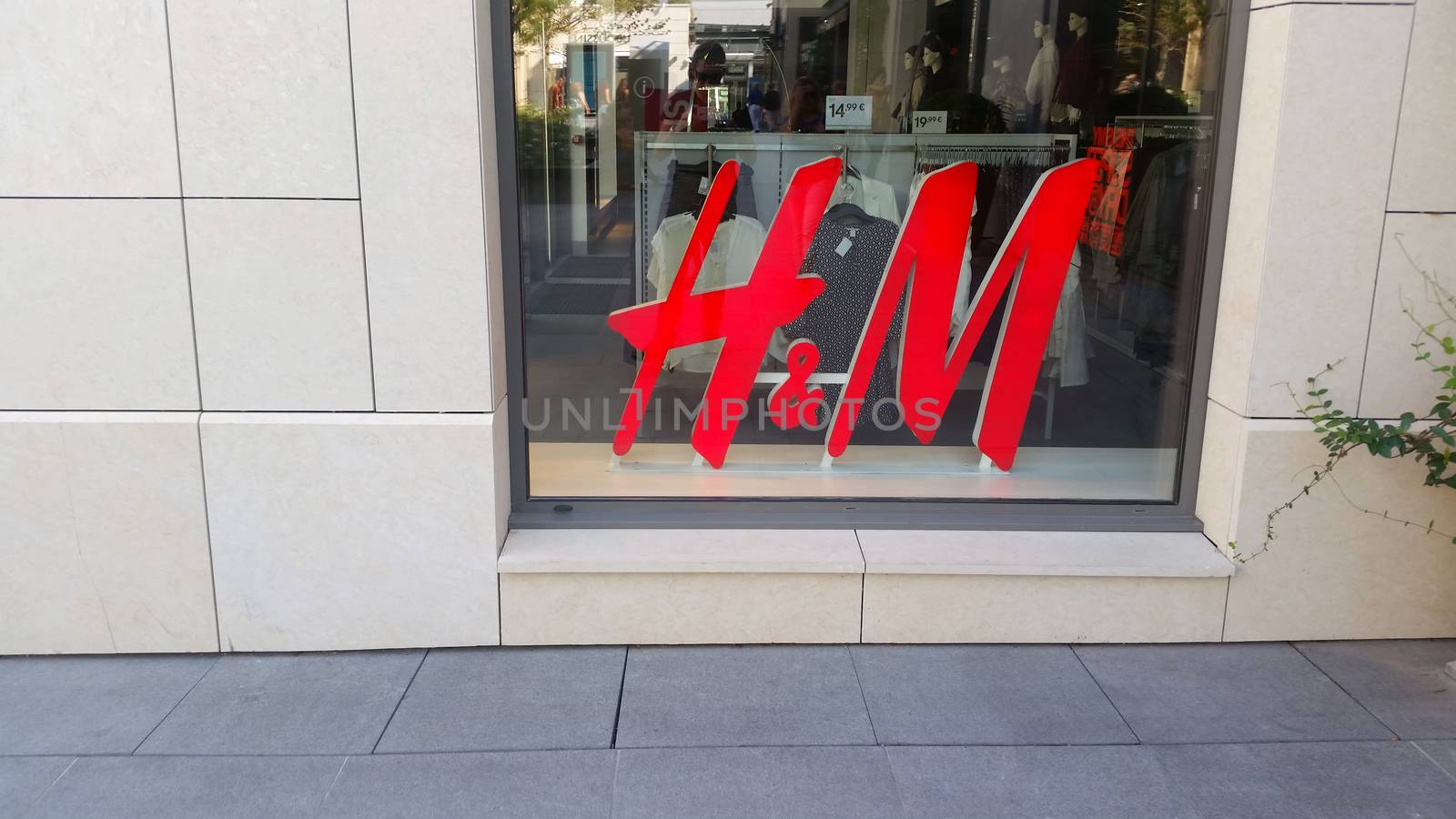 Cagnes-sur-Mer, France - September 25, 2016: Window And Logo Of H&M Store in the City Center of Cagnes-sur-Mer (French Riviera)