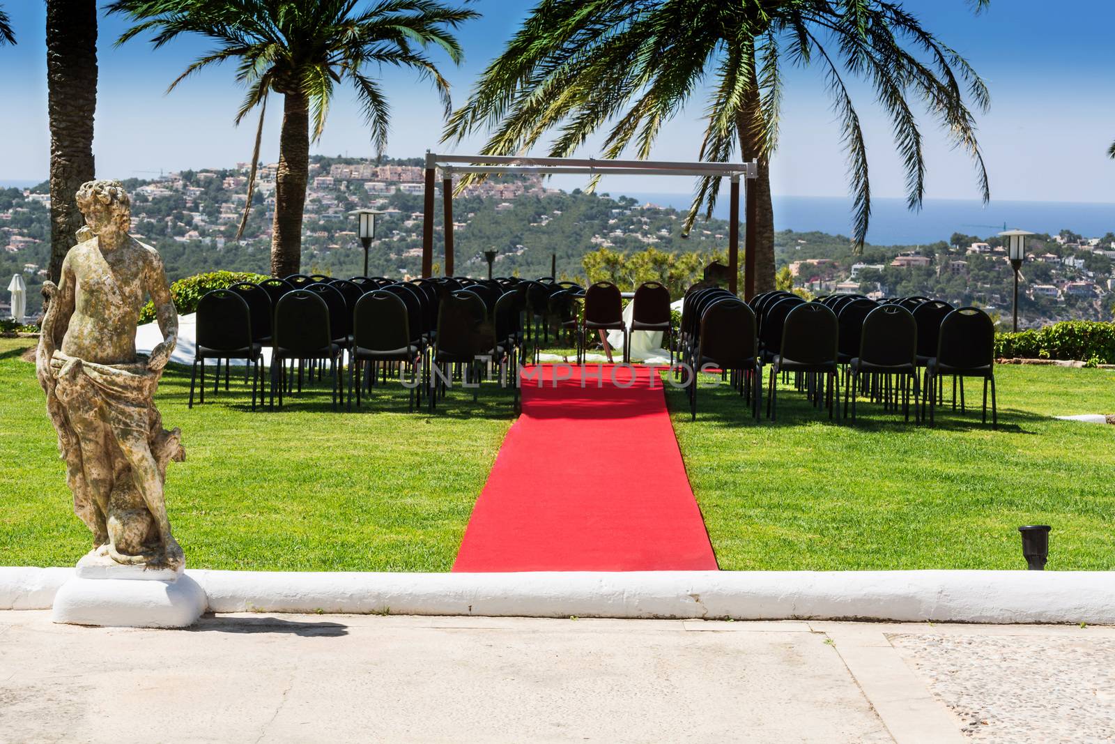 Red Carpet Event in front of a Mediterranean background