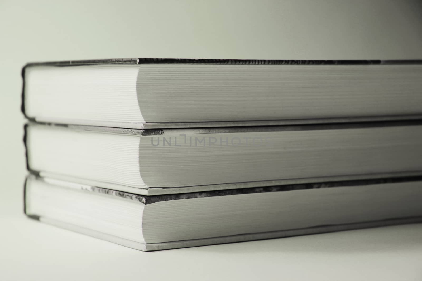 Books close up black and white isolated